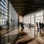 People walking through an airport