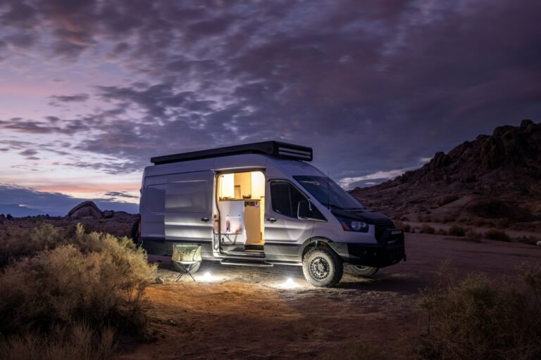 Van with door open at dusk
